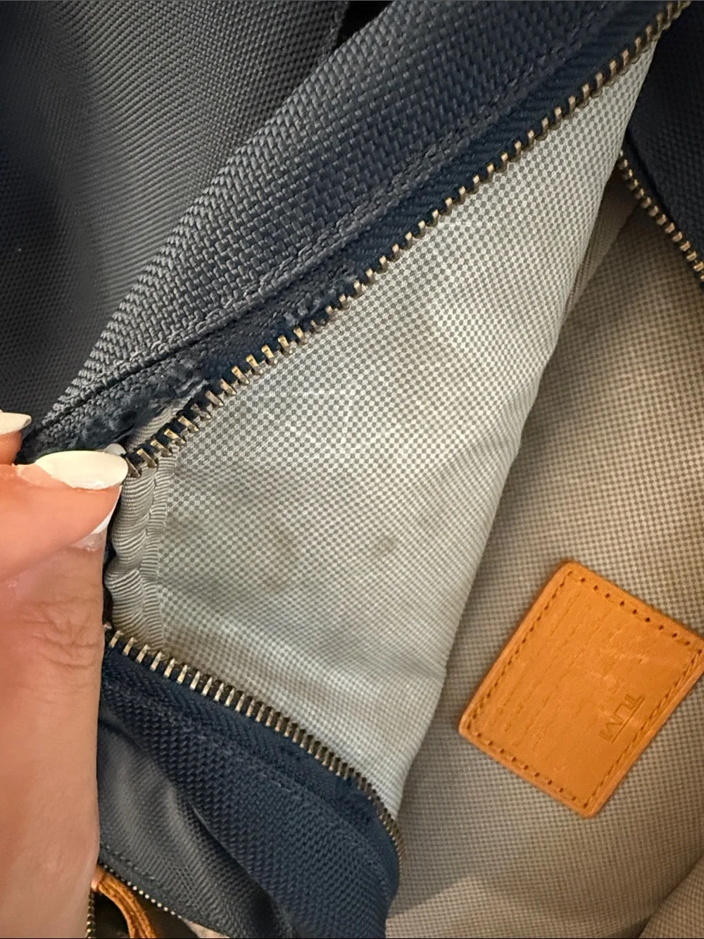 Tumi Navy and Gray Backpack with Tan Accents